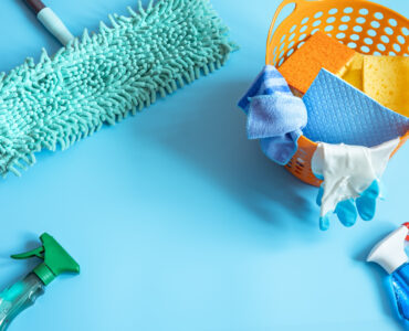 colorful-composition-with-mop-sponges-rags-gloves-detergents-general-cleaning-cleaning-service-concept-background
